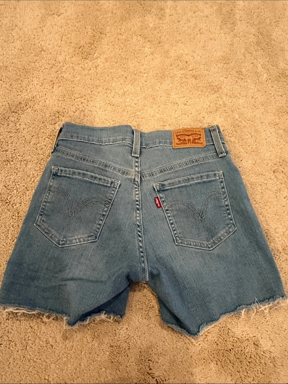 Levi's Light Blue Denim Frayed Hem Shorts - Mid Length in I’m Just a fan